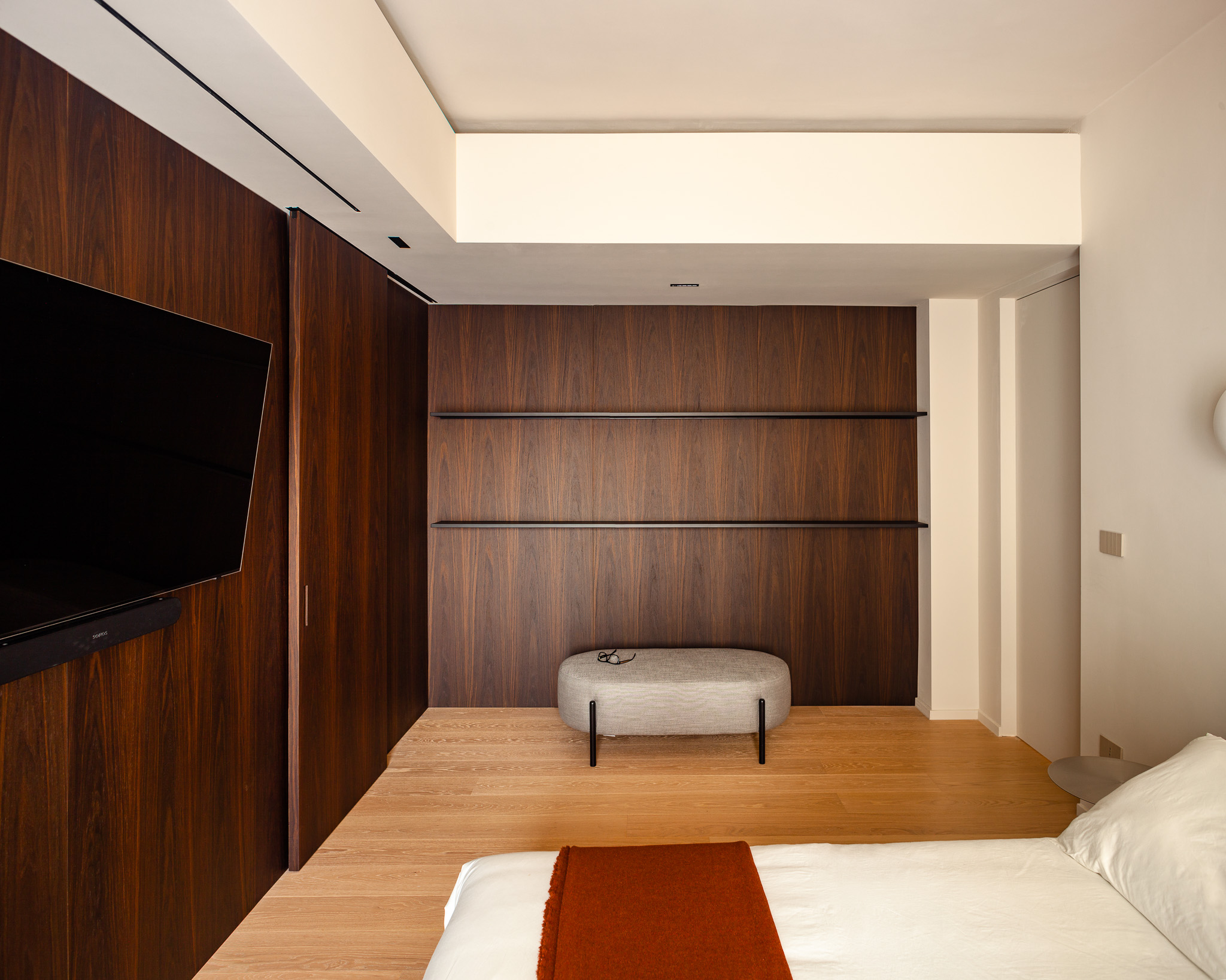Walnut joinery in the master bedroom