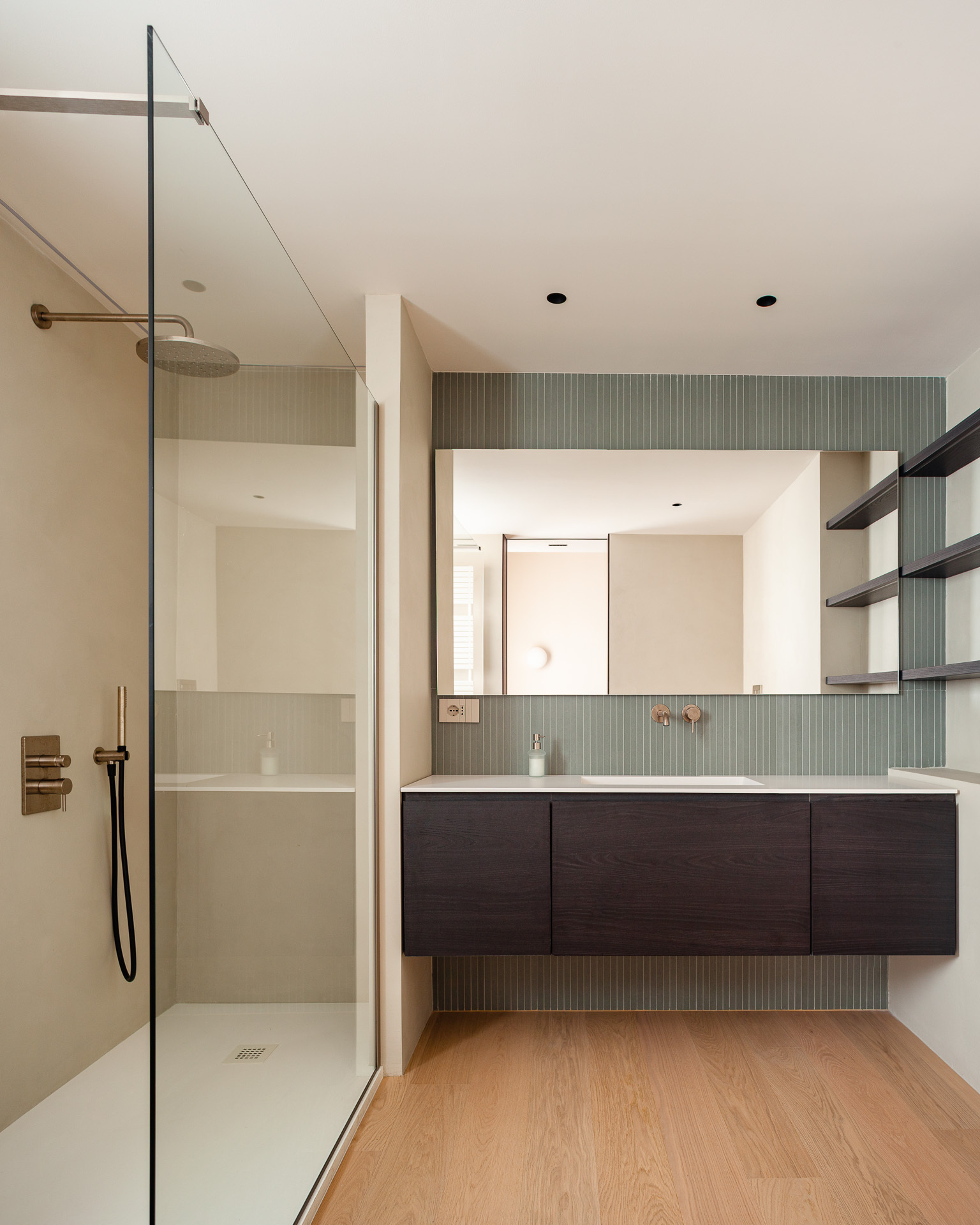 Main bathroom at Grimaldi Residence with sage zellige and a glass shower